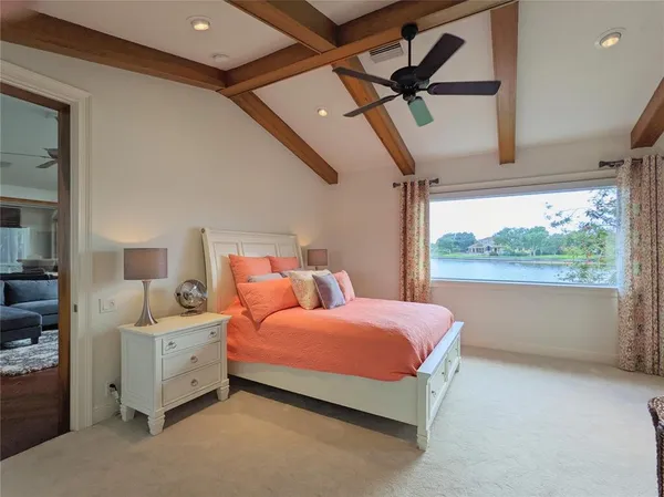a living room with a fireplace and a flat screen tv