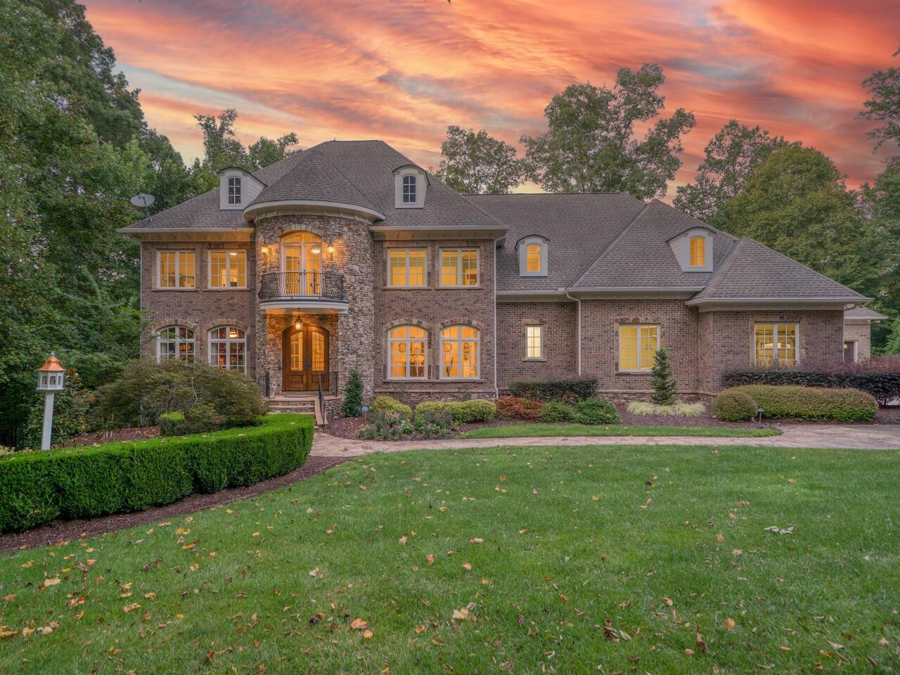 11216 Jonas Ridge Lane Raleigh, NC 27613 - Photo 1 of 75 Renovated by owner owner, residence situated within a prestigious gated community. Unparalleled seclusion on this 3.77 acres of lush, landscapedestate that abuts undisturbed buffer land, creating a haven of tranquility.