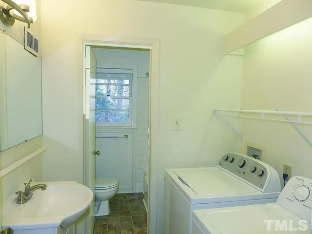 a view of a room with large windows