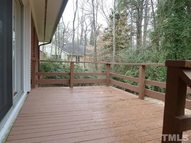 a view of backyard with plants and lake