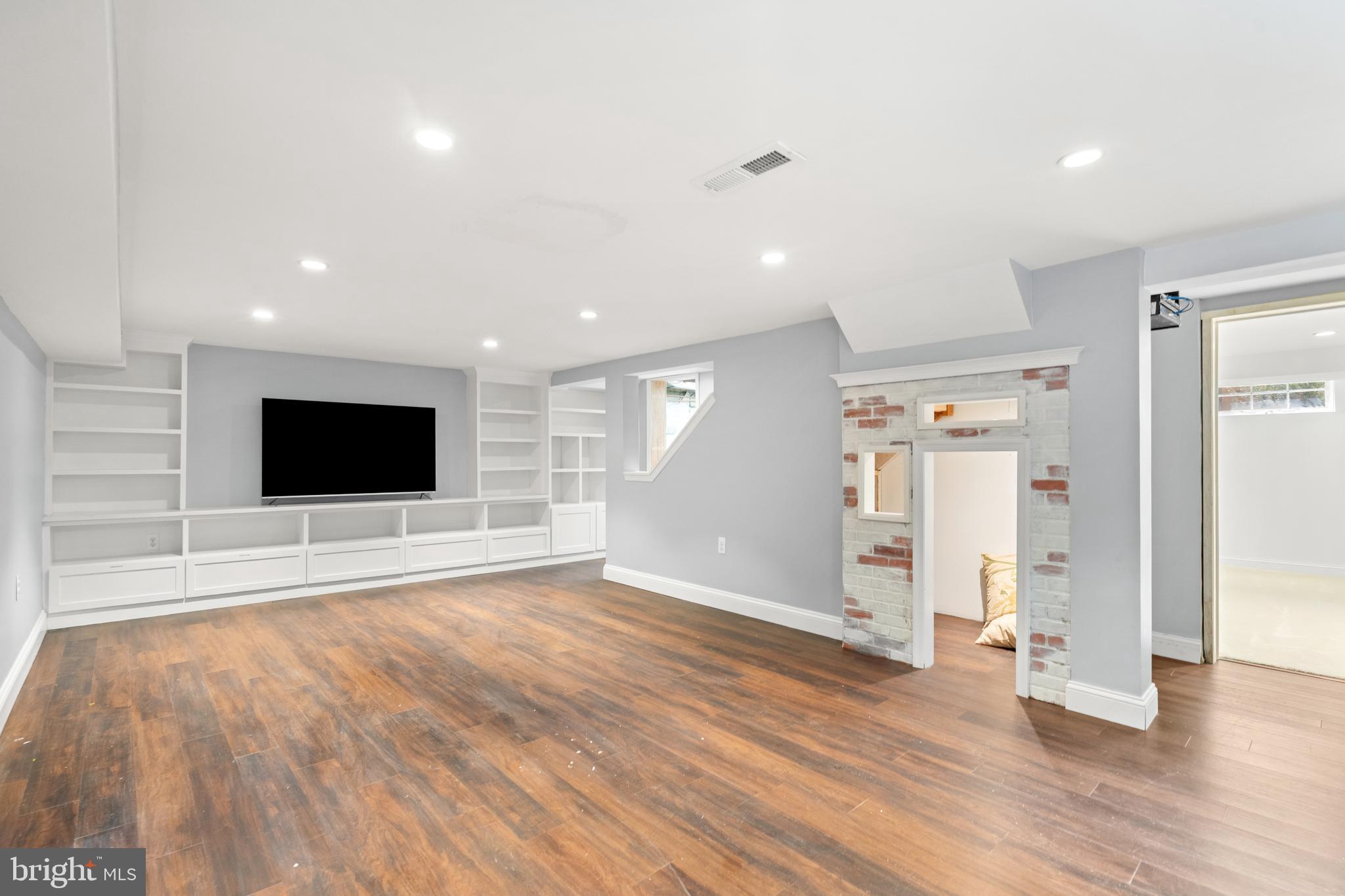 10208 Edgewood Avenue Silver Spring, MD 20901 - Photo 26 of 40 Recreation Room- built in shelving