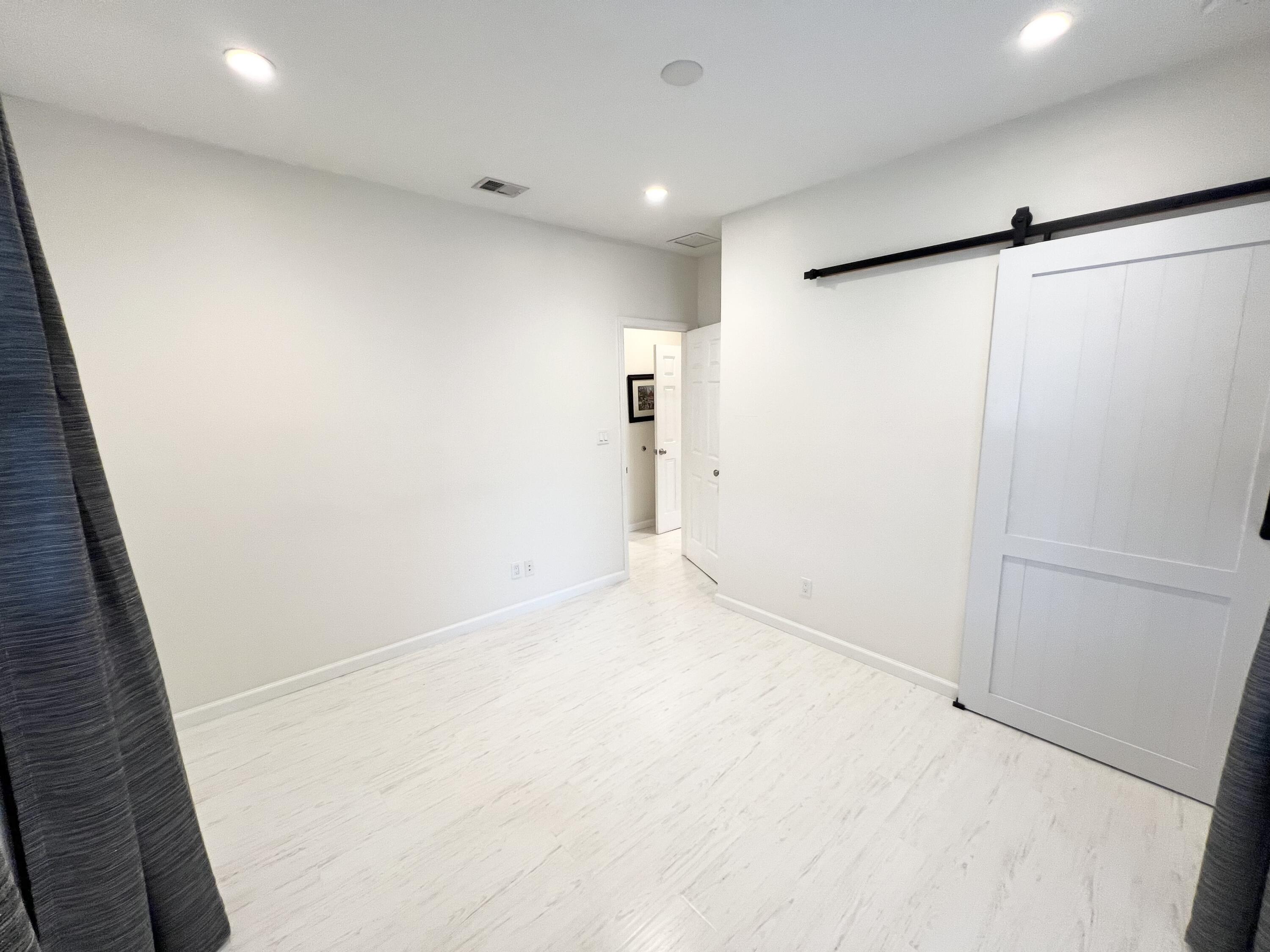 431 Ardmore Road West Palm Beach, FL 33401 - Photo 7 of 13 a view of an empty room
