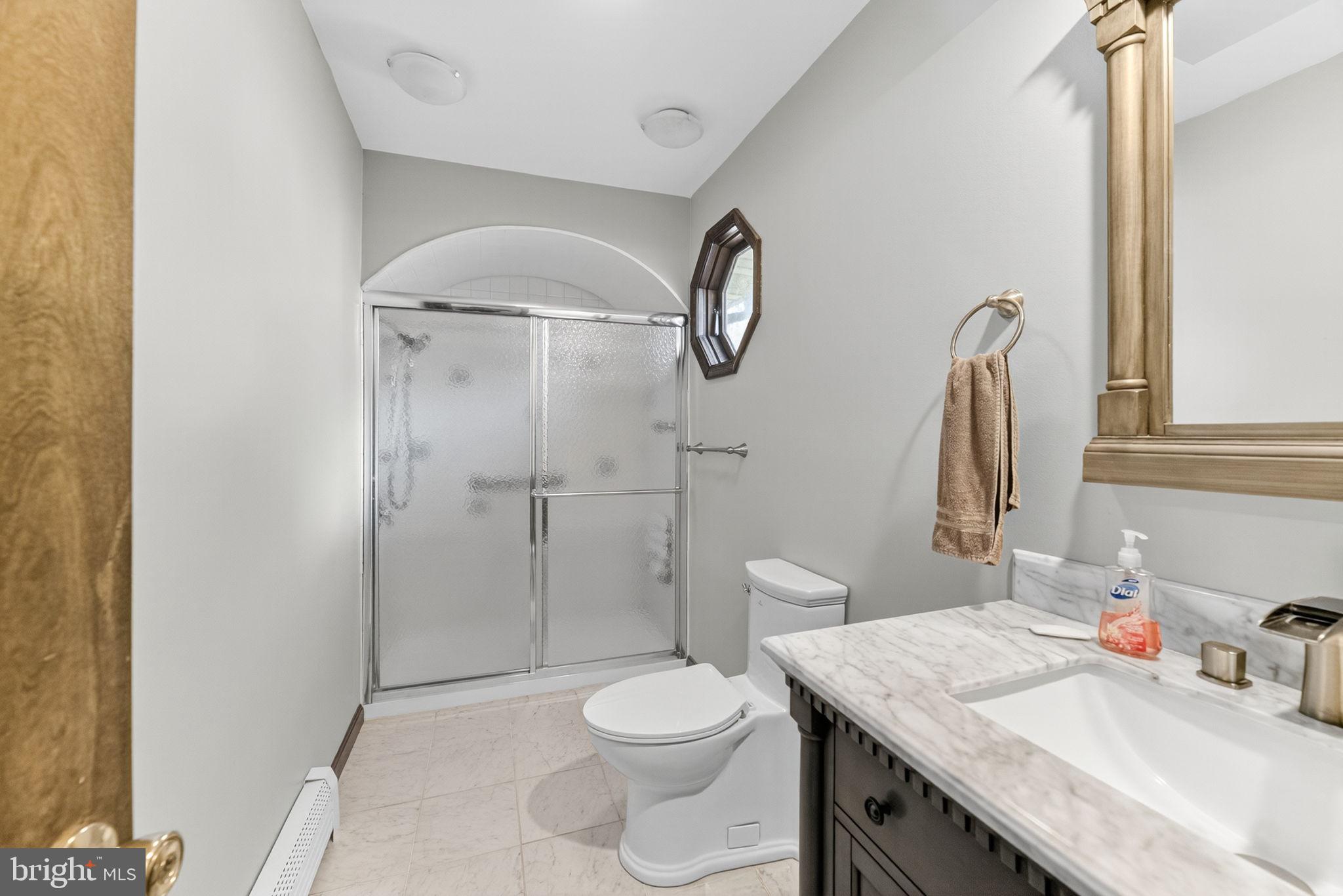 394 Flagstaff Road Lehighton, PA 18235 - Photo 20 of 73 a bathroom with a granite countertop sink toilet and shower