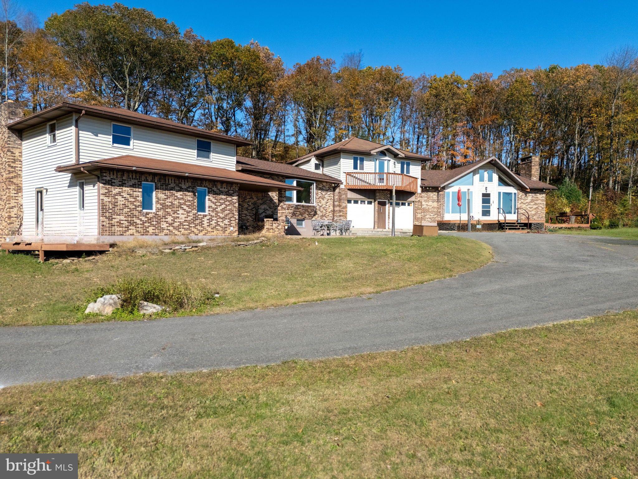 394 Flagstaff Road Lehighton, PA 18235 - Photo 2 of 73 a front view of a house with a yard and garage