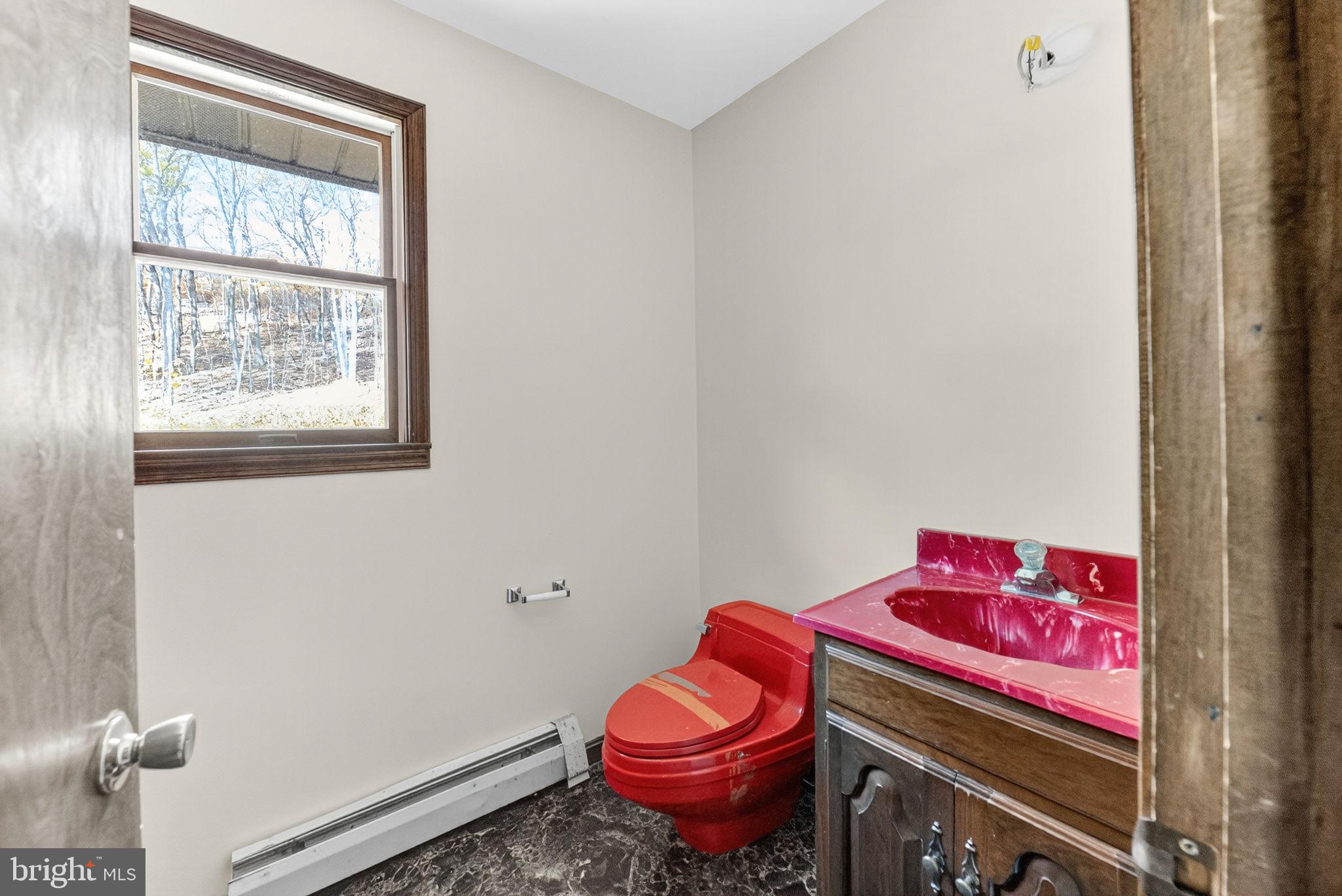 394 Flagstaff Road Lehighton, PA 18235 - Photo 27 of 73 a bathroom with a granite countertop toilet and a sink