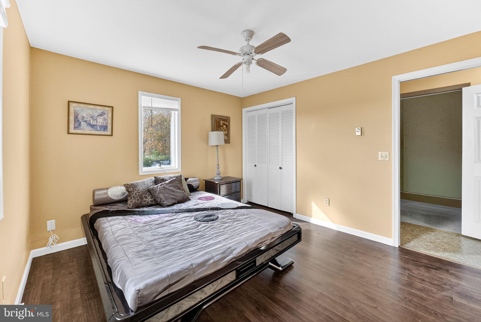 394 Flagstaff Road Lehighton, PA 18235 - Photo 31 of 73 a bedroom with a bed and wooden floor
