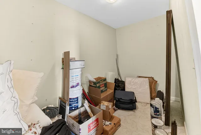 a bathroom with a toilet a sink and a window
