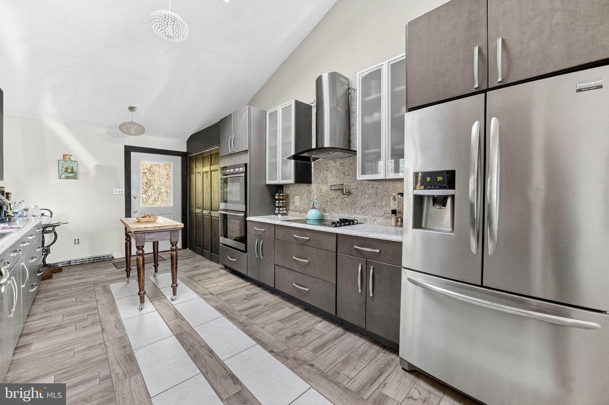 394 Flagstaff Road Lehighton, PA 18235 - Photo 39 of 73 a kitchen with stainless steel appliances a refrigerator sink and cabinets