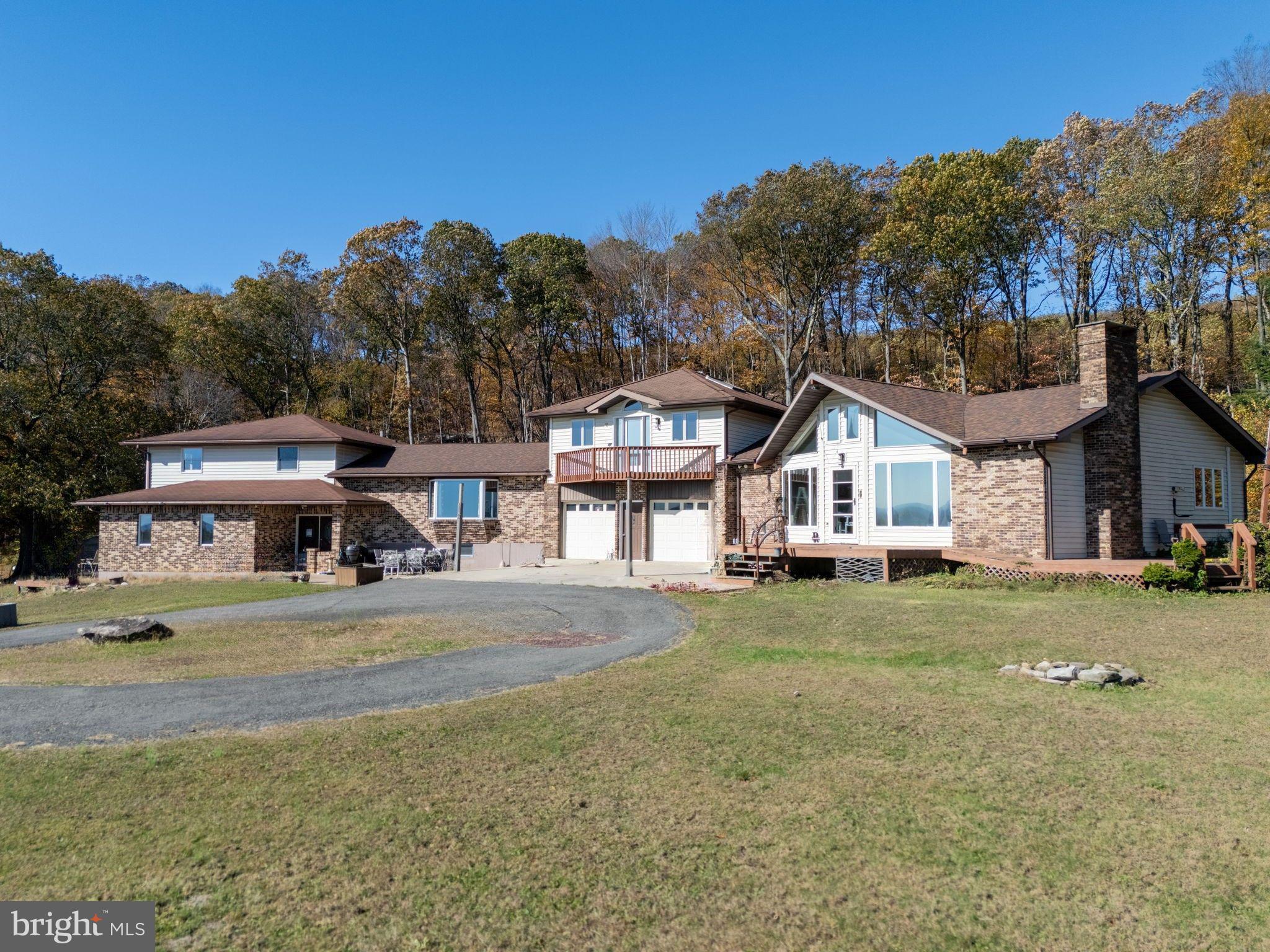 394 Flagstaff Road Lehighton, PA 18235 - Photo 4 of 73 a front view of a house with a yard and garage