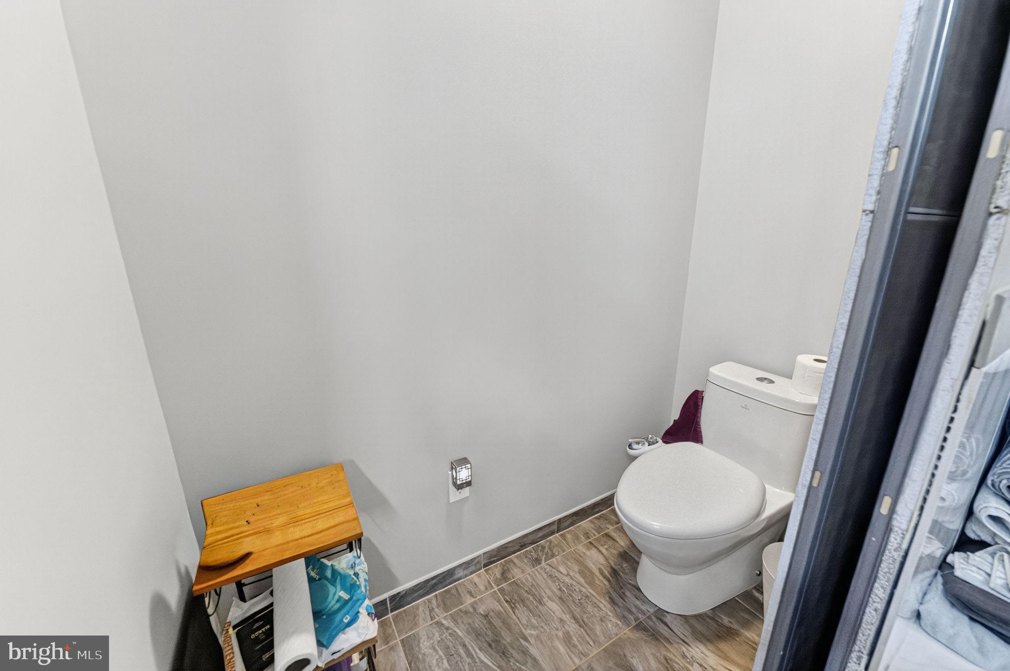 394 Flagstaff Road Lehighton, PA 18235 - Photo 49 of 73 a white toilet sitting next to a small window