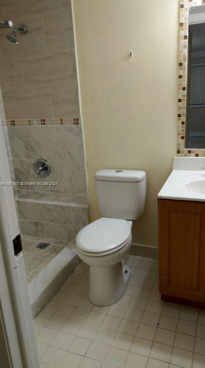 15620 Southwest 80th Street, Unit H107 Miami, FL 33193 - Photo 6 of 7 a bathroom with a toilet and a sink