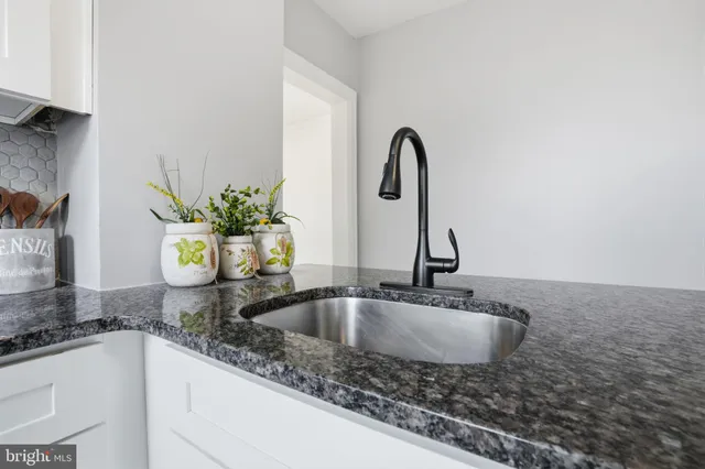 a bathroom with a toilet and a sink