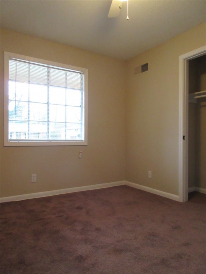 4324 Sidney Road Memphis, TN 38116 - Photo 7 of 8 an empty room with a window