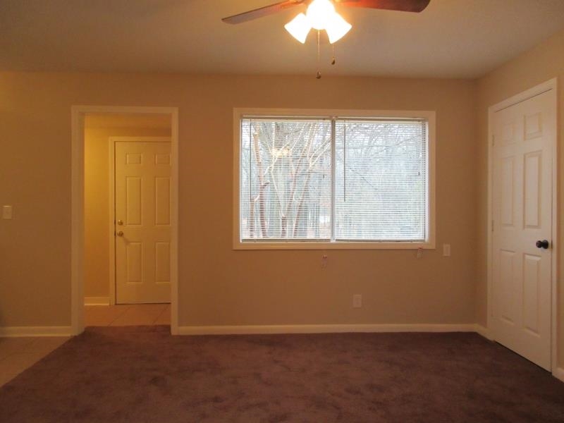 4324 Sidney Road Memphis, TN 38116 - Photo 8 of 8 an empty room with a window