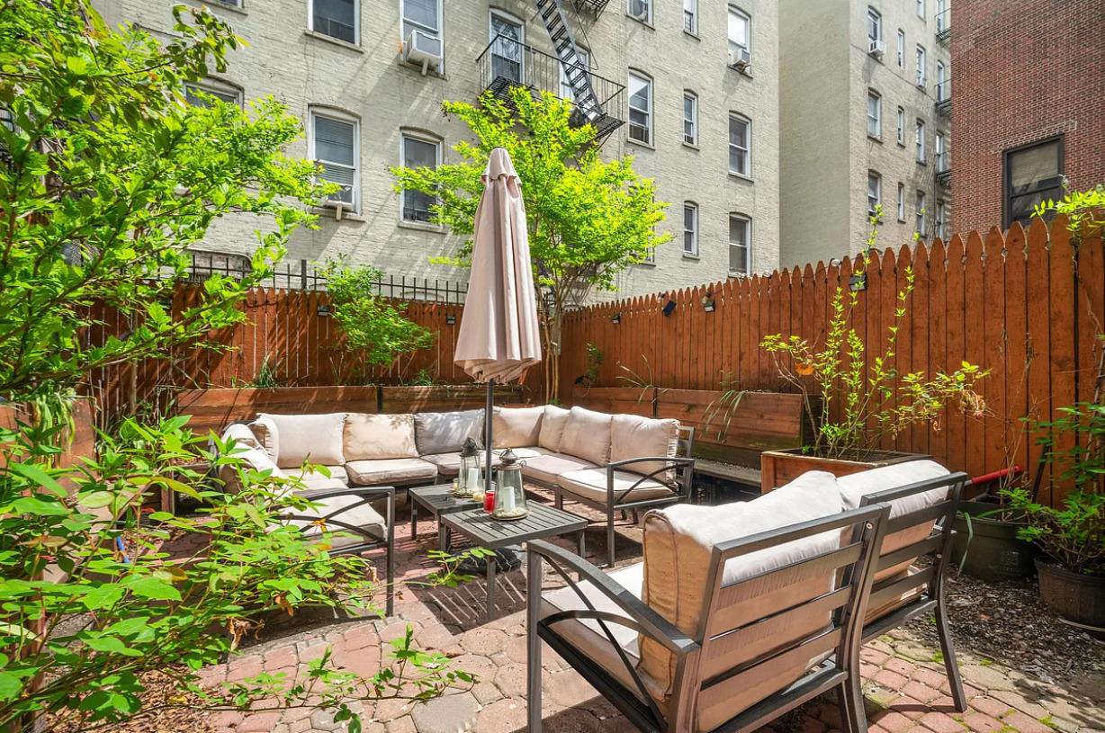 475 West 146th Street Manhattan, NY 10031 - Photo 19 of 19 a view of a patio with table and chairs potted plants