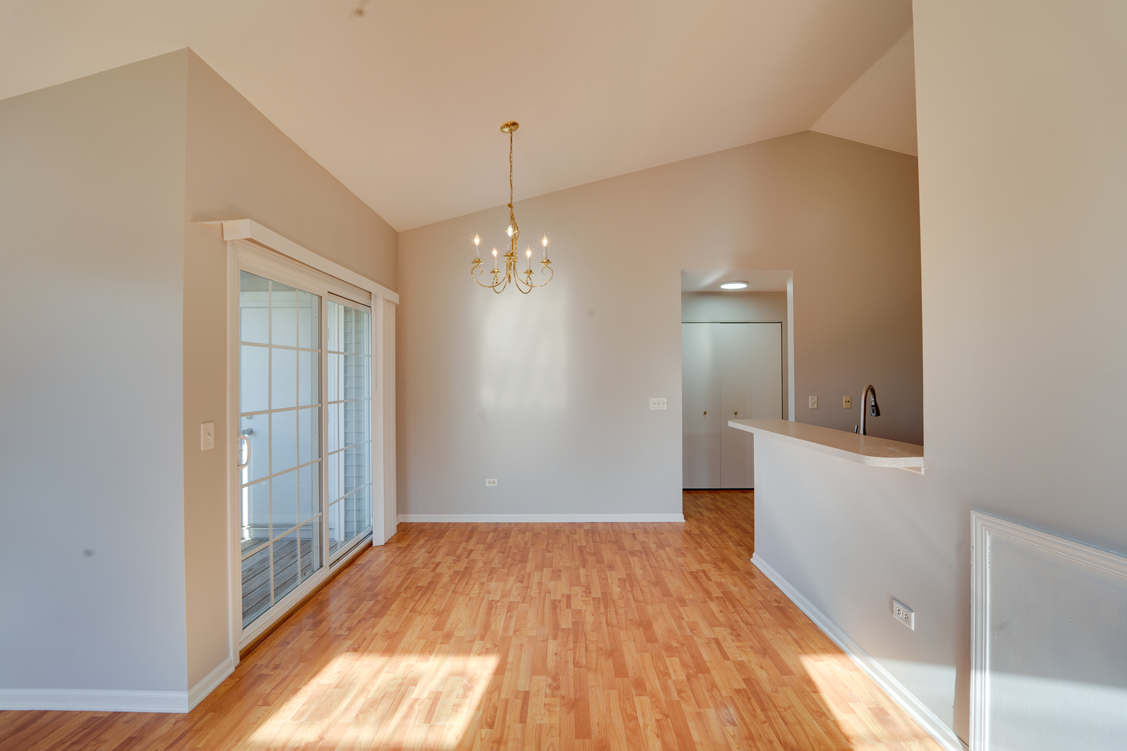 1231 Silverstone Drive, Unit 1231 Carpentersville, IL 60110 - Photo 6 of 22 a view of a room with wooden floor and staircase