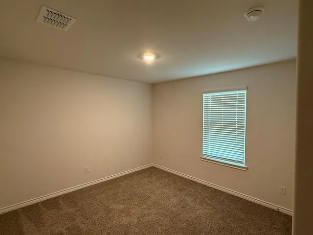 a bathroom with a toilet a sink and bathtub