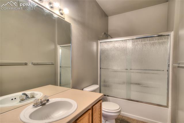 2002 Legacy Ridge View, Unit 201 Colorado Springs, CO 80910 - Photo 25 of 34 Baths have Glass Shower Doors