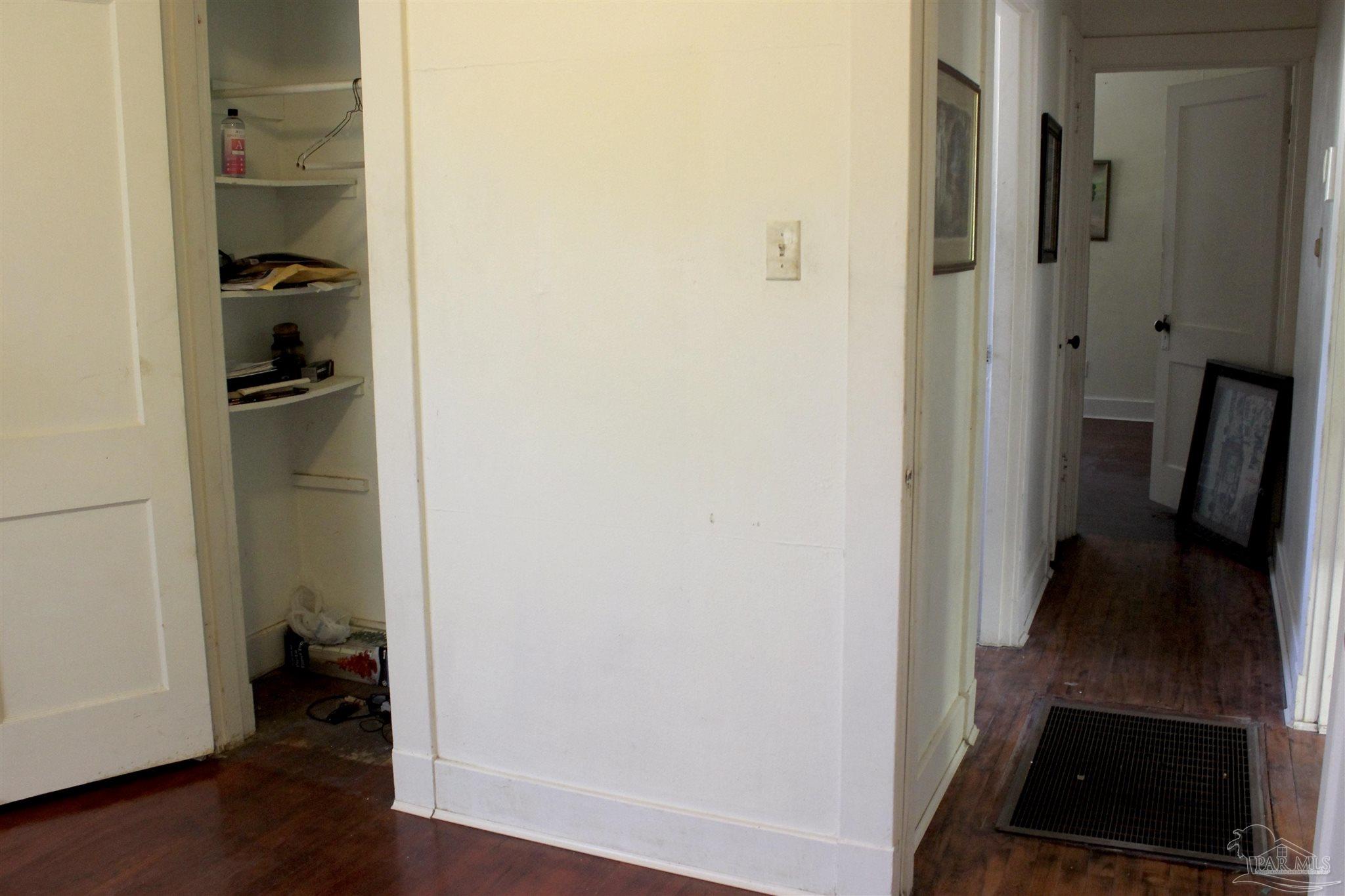 1120 South Old Corry Field Road Pensacola, FL 32507 - Photo 19 of 46 Looking down hall toward larger bedroom & bath