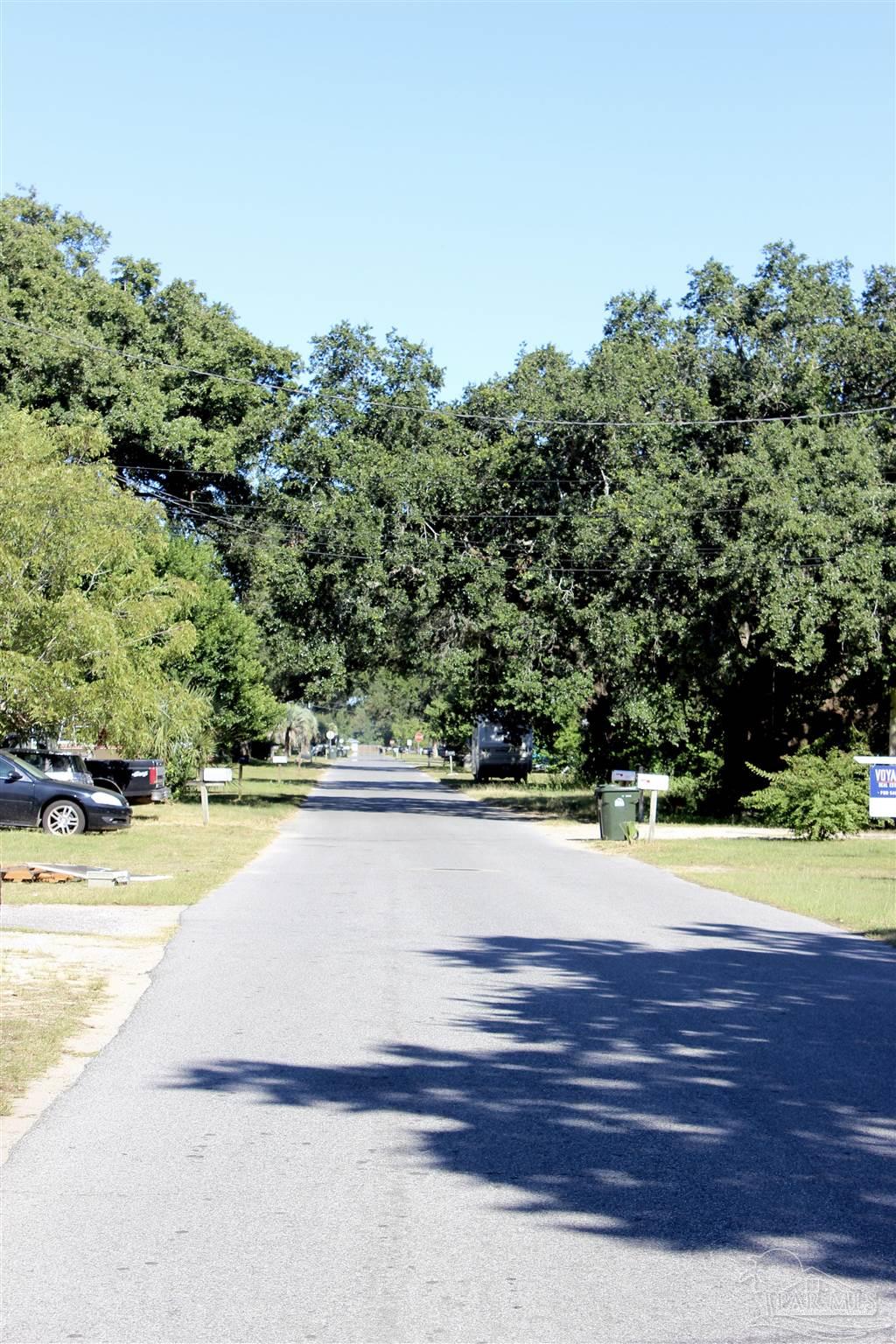 1120 South Old Corry Field Road Pensacola, FL 32507 - Photo 46 of 46 Poppy runs alongside the house