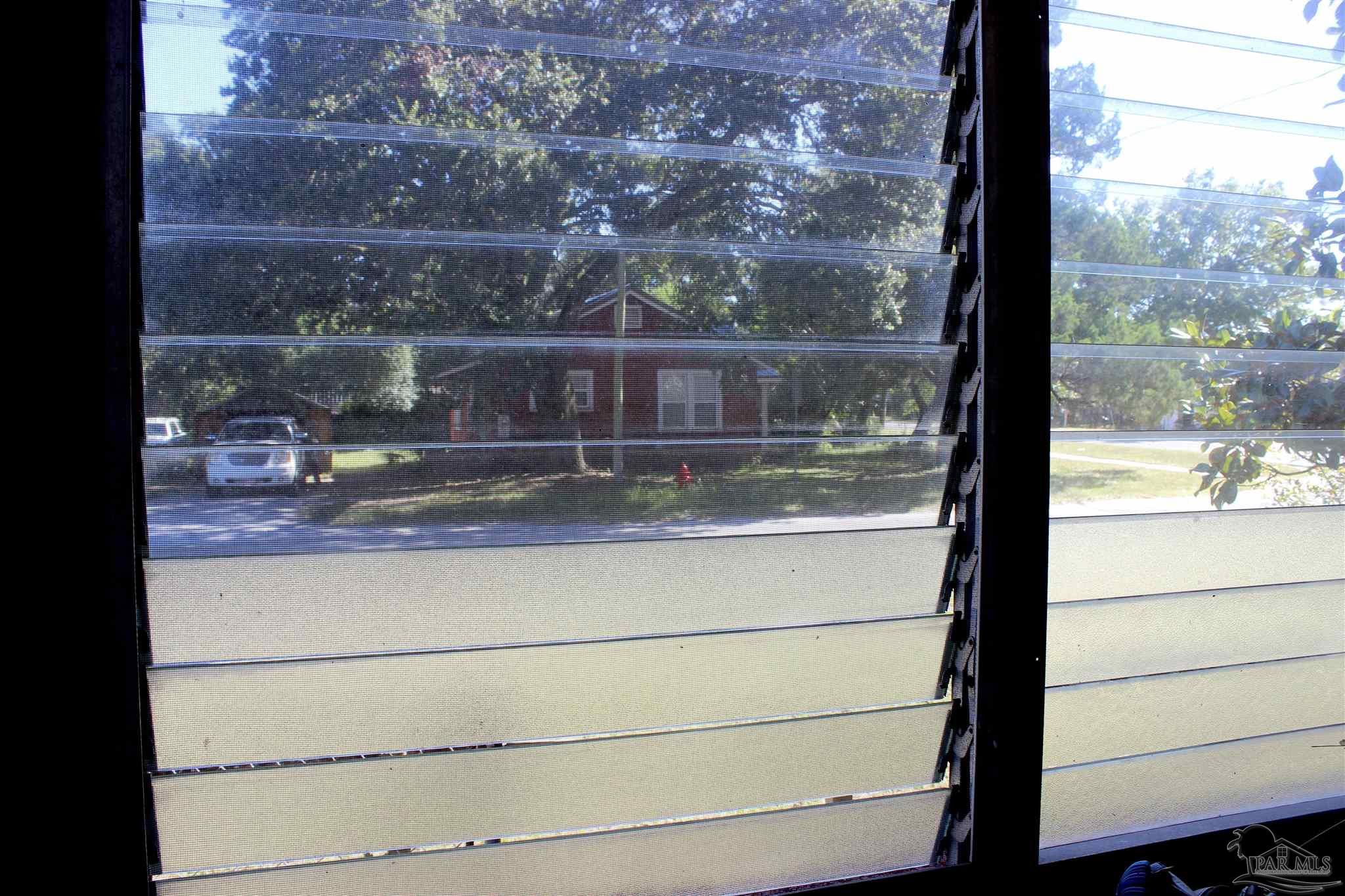 1120 South Old Corry Field Road Pensacola, FL 32507 - Photo 9 of 46 Lets in lots of light on the porch!