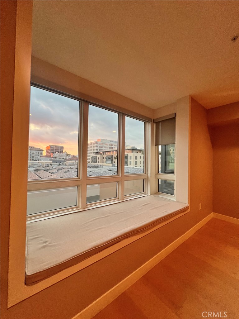 39 South Los Robles Avenue Pasadena, CA 91101 - Photo 21 of 36 a view of an empty room with a floor to ceiling window and an empty room