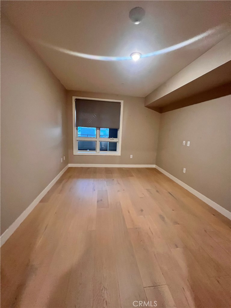 39 South Los Robles Avenue Pasadena, CA 91101 - Photo 29 of 36 an empty room with a empty space and windows