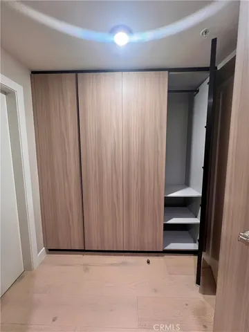 a bathroom with a shower and a sink