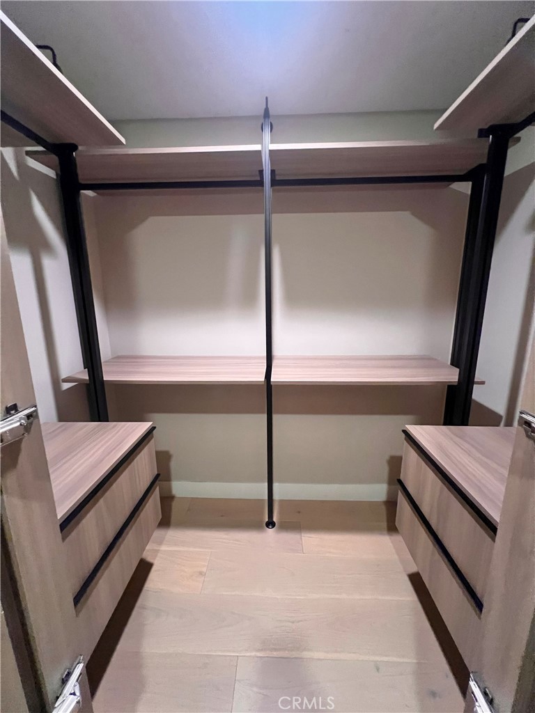 39 South Los Robles Avenue Pasadena, CA 91101 - Photo 35 of 36 a bathroom with a sink and mirror