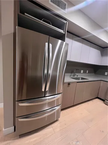 a stove top oven sitting inside of a kitchen