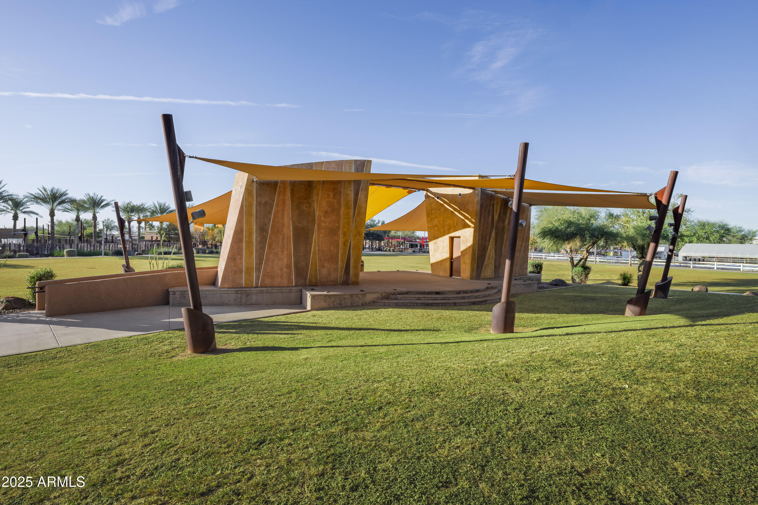9314 East Strobe Avenue Mesa, AZ 85212 - Photo 20 of 27 a view of swimming pool with a yard