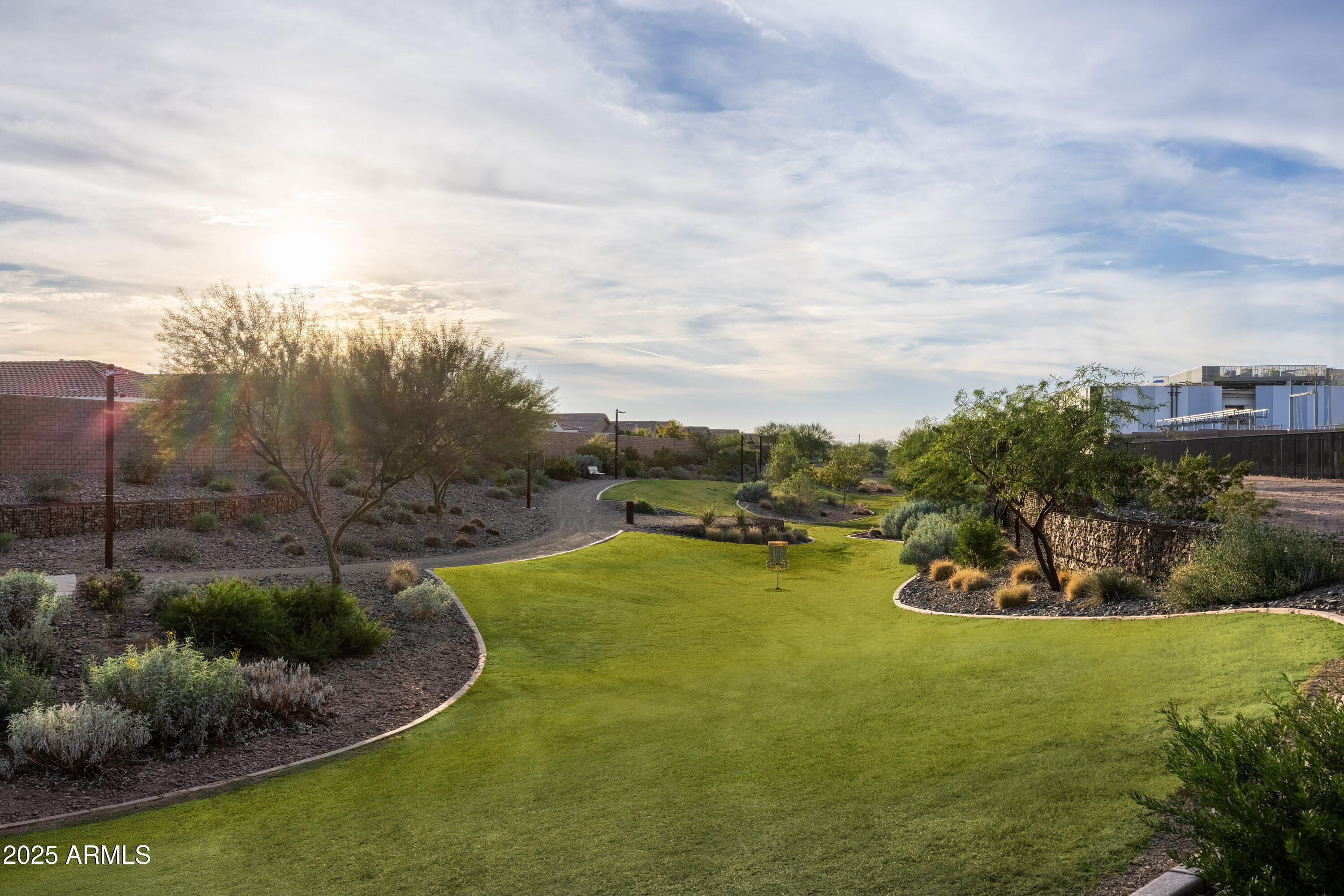 9314 East Strobe Avenue Mesa, AZ 85212 - Photo 26 of 27 a view of a swimming pool and mountains in the background