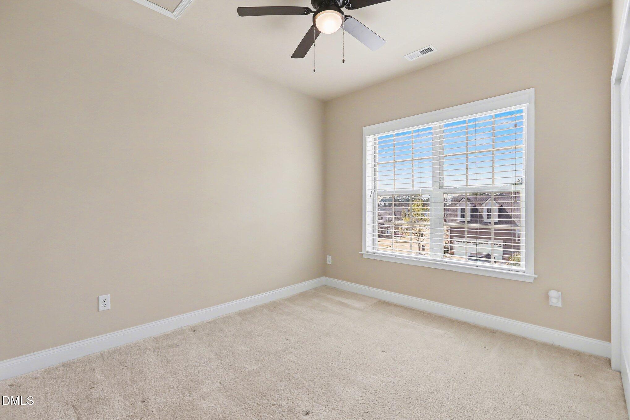 351 Gartrell Way Cary, NC 27519 - Photo 25 of 51 an empty room with a window