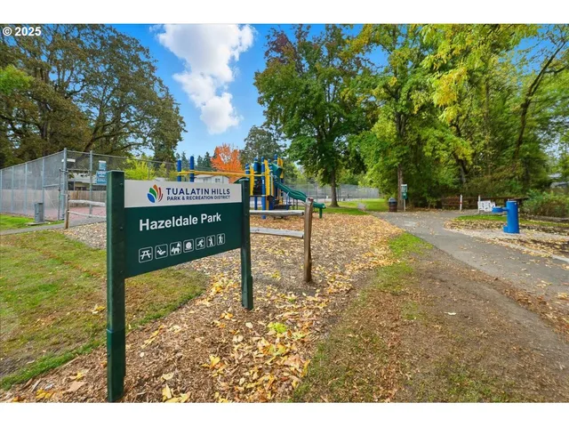 a view of a street with trees