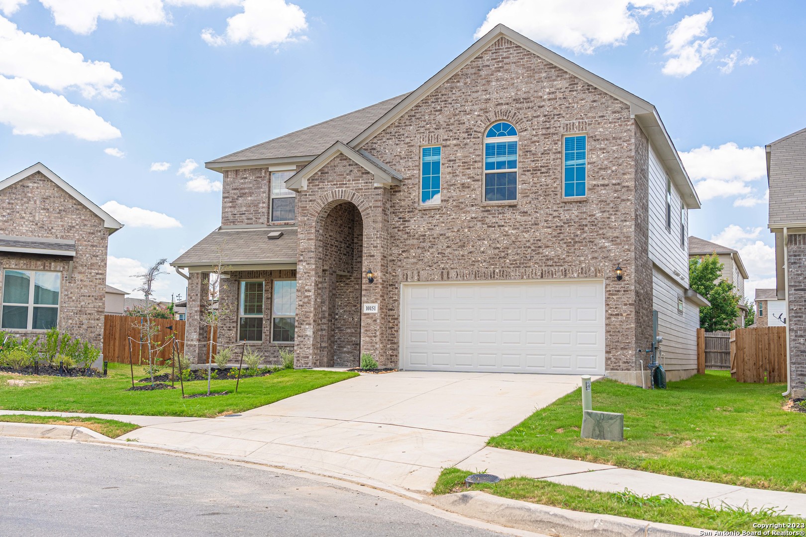 10151 Bussang Road Schertz, TX 78154 - Photo 1 of 1 a front view of a house with a yard and garage
