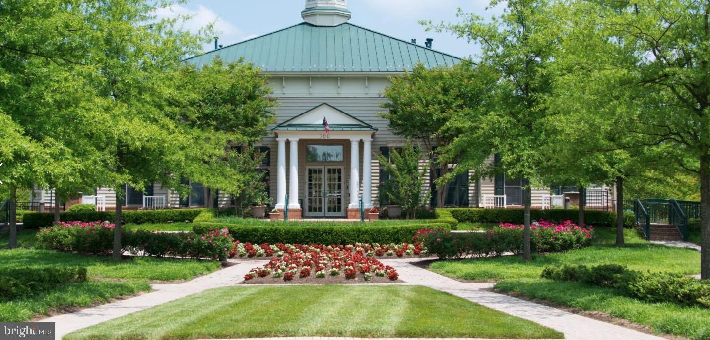 306 Pure Spring Crescent Rockville, MD 20850 - Photo 17 of 18 Lush gardens frame a charming entrance.