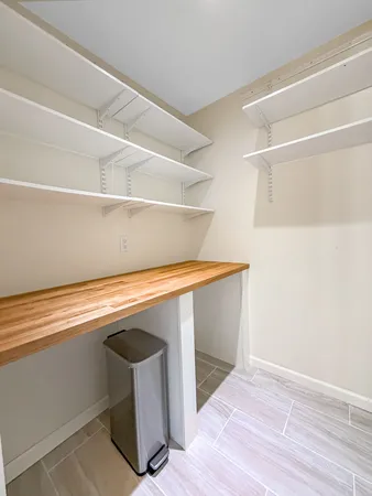 a room with a desk and chair