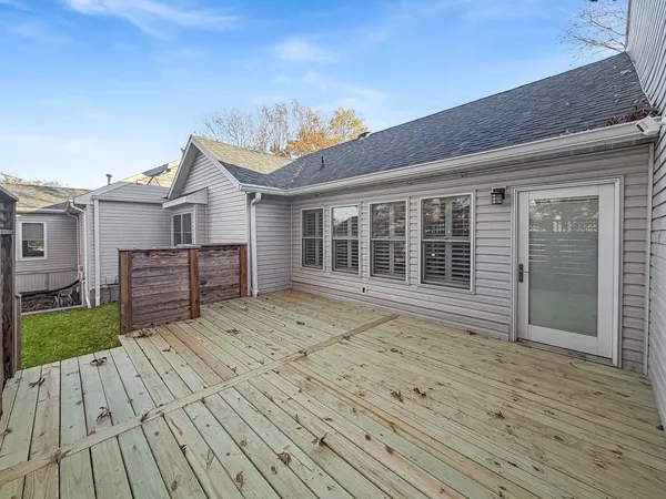 a view of house with wooden floor and outdoor space