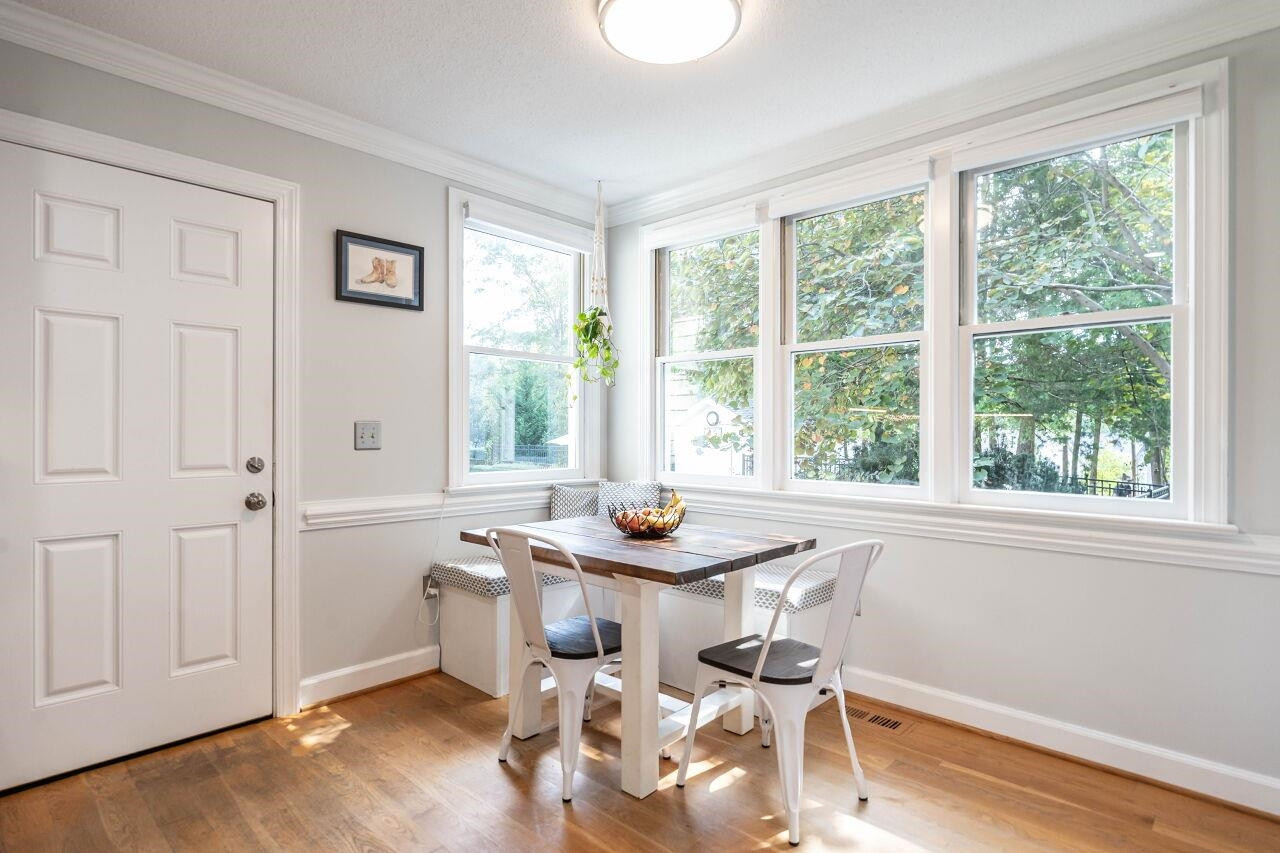 5924 Clearsprings Drive Wake Forest, NC 27587 - Photo 16 of 37 a dining room with furniture and wooden floor