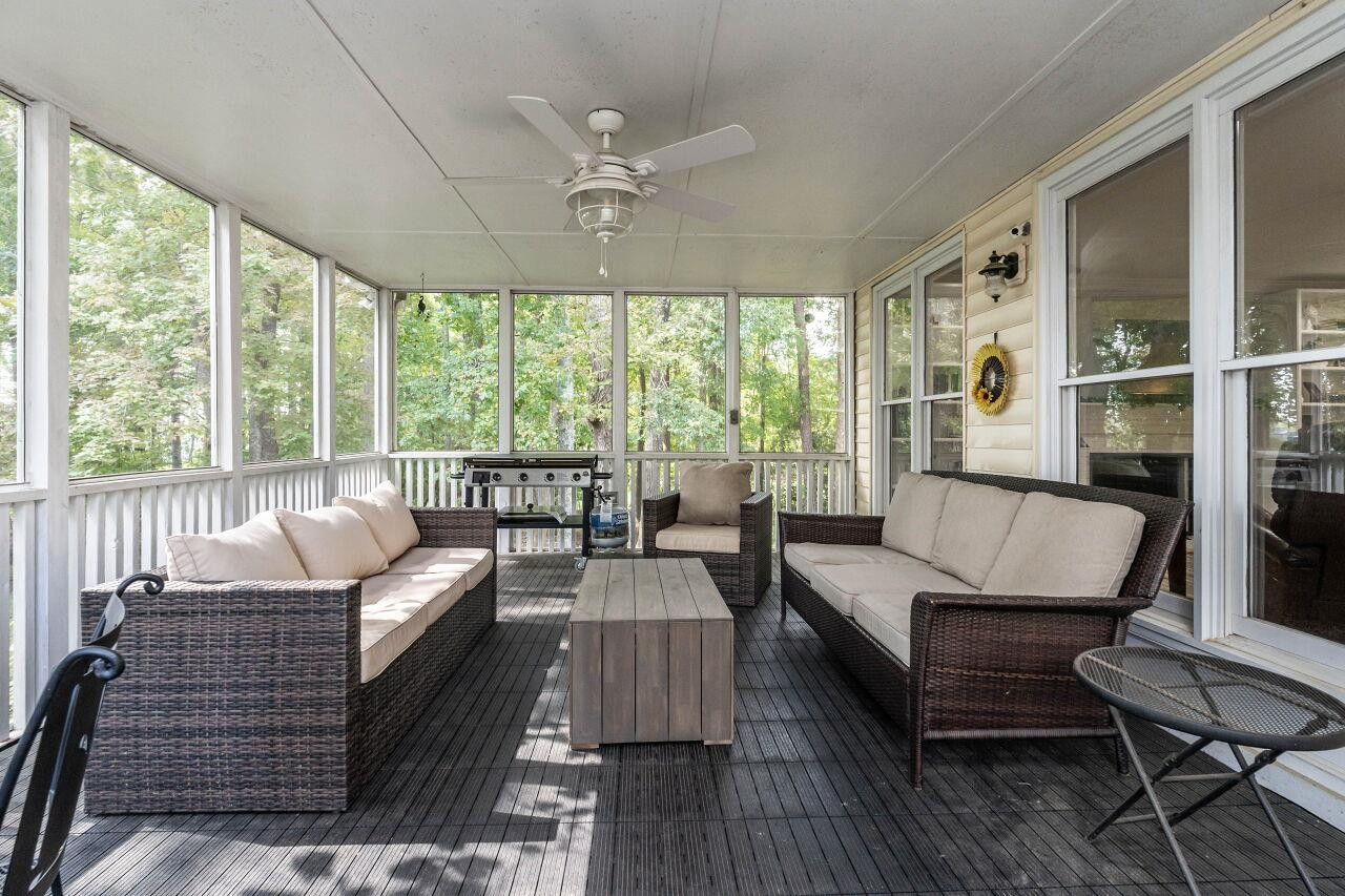 5924 Clearsprings Drive Wake Forest, NC 27587 - Photo 29 of 37 a living room with furniture and a large window