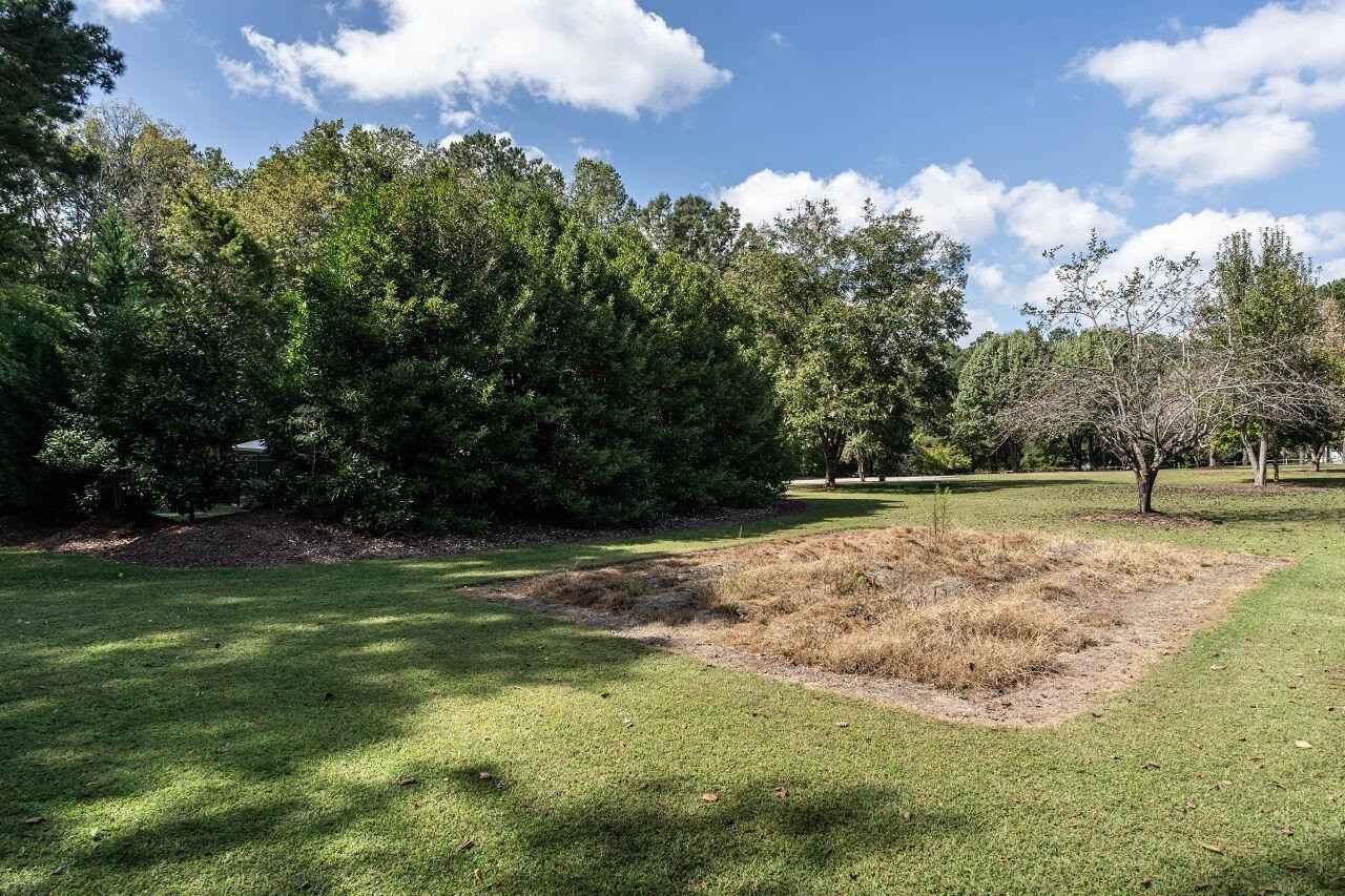 5924 Clearsprings Drive Wake Forest, NC 27587 - Photo 31 of 37 a view of outdoor space with deck and yard