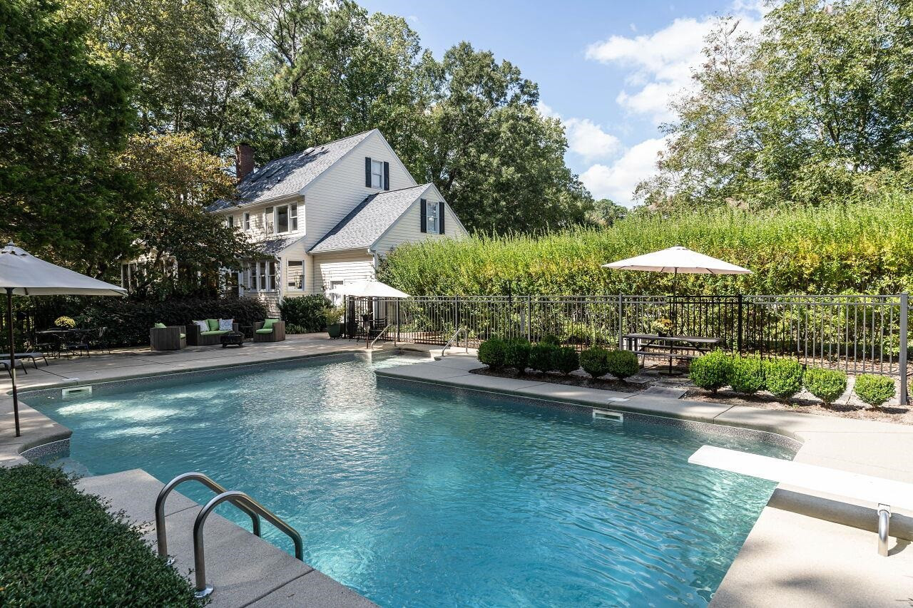 5924 Clearsprings Drive Wake Forest, NC 27587 - Photo 33 of 37 a swimming pool with outdoor seating and yard