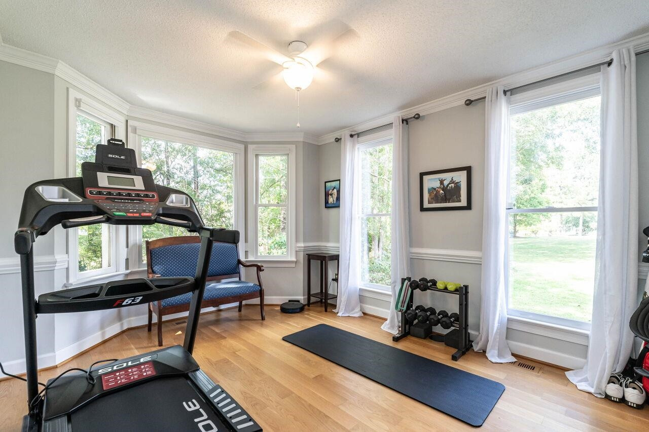 5924 Clearsprings Drive Wake Forest, NC 27587 - Photo 5 of 37 a bedroom with furniture and a window