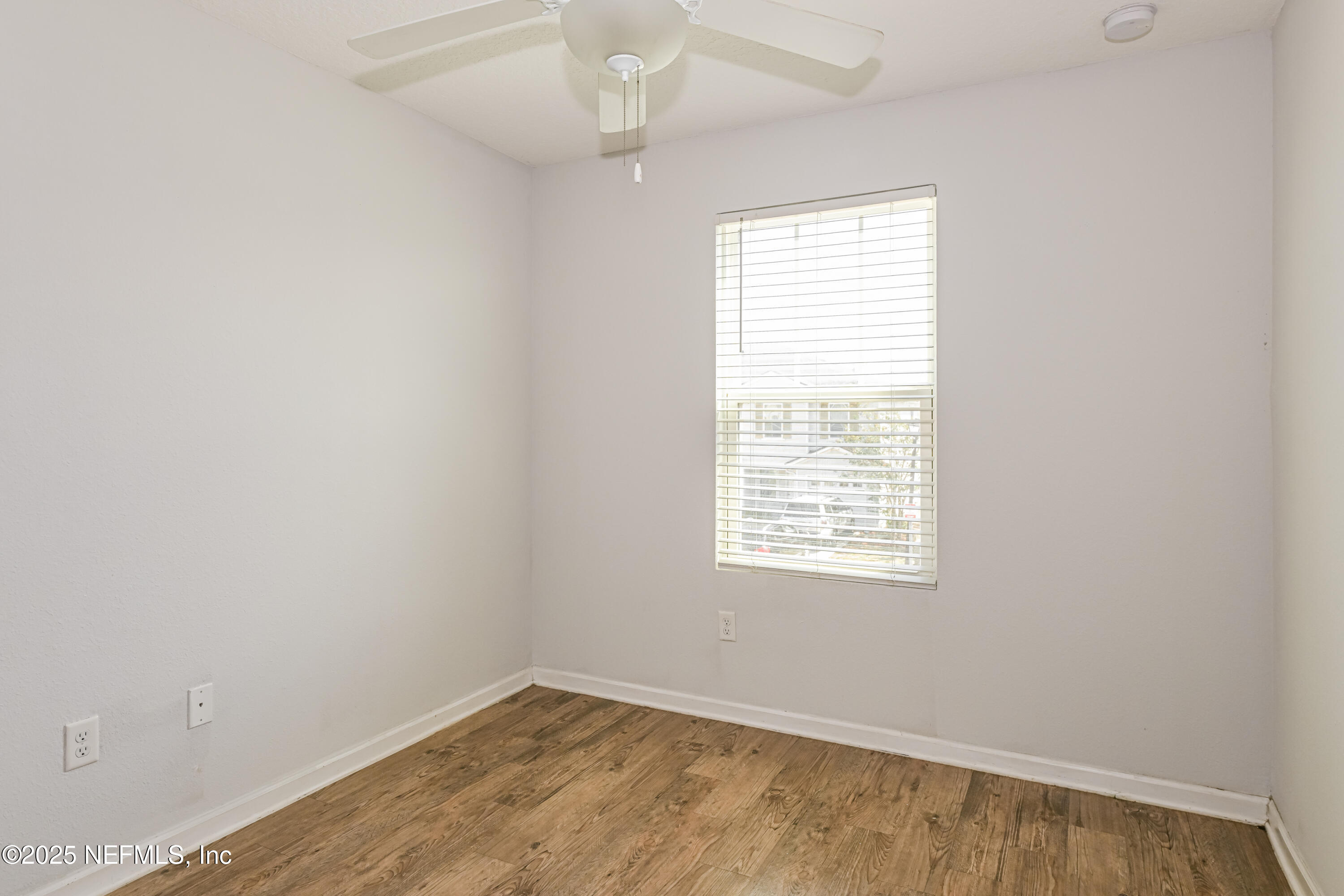548 Eiseman Way Jacksonville, FL 32216 - Photo 11 of 15 an empty room with a window