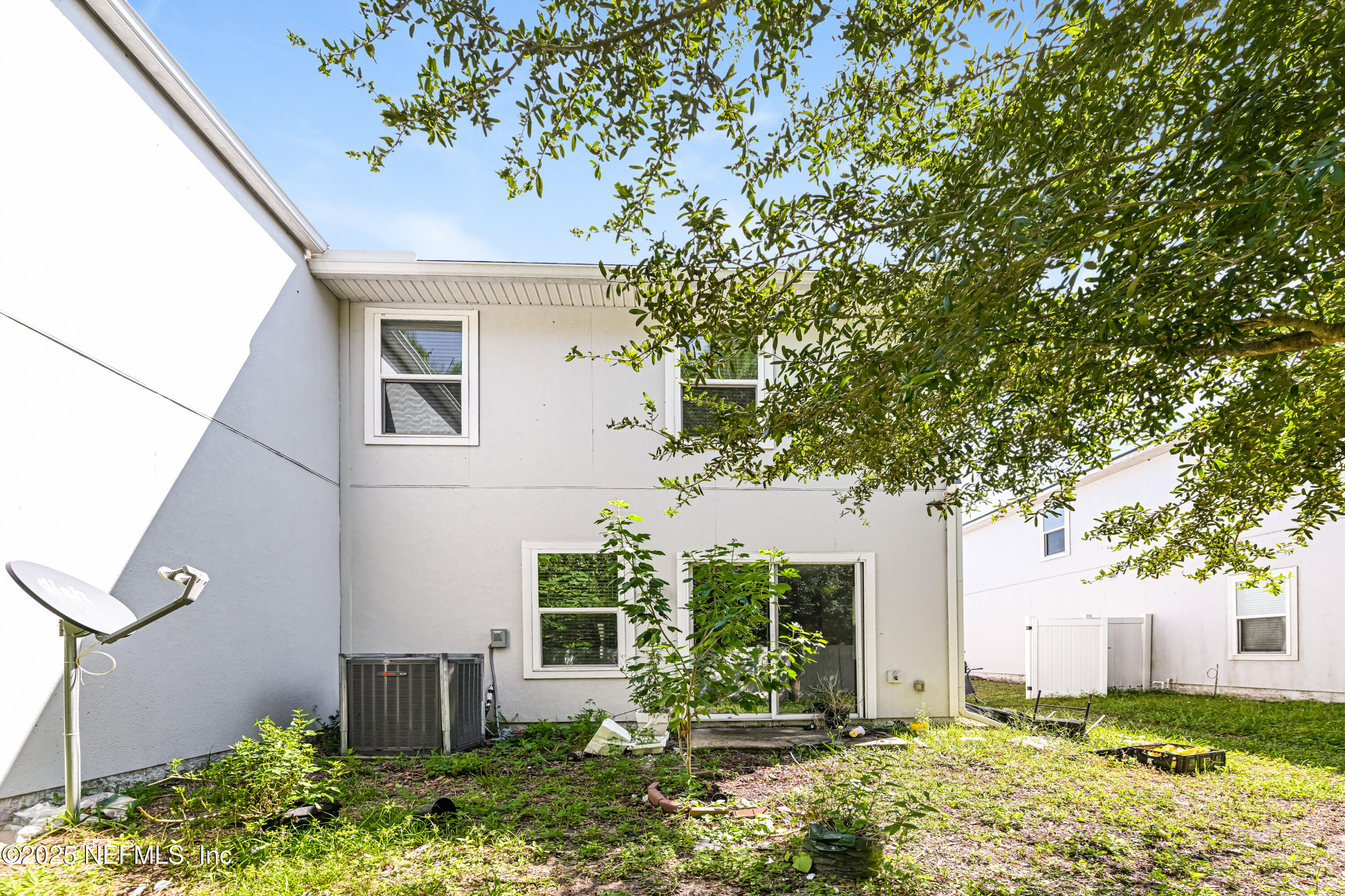 548 Eiseman Way Jacksonville, FL 32216 - Photo 15 of 15 a front view of a house with garden