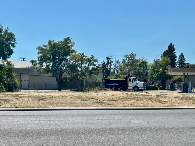 a house with trees in the background