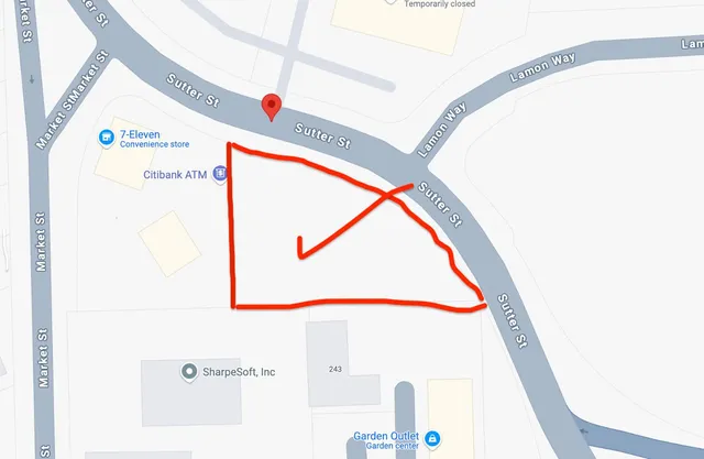 a picture of a room with a small table and chairs