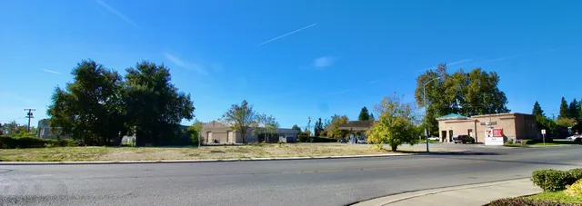 a view of street with houses