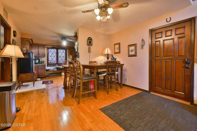 a view of a chairs and table in a patio