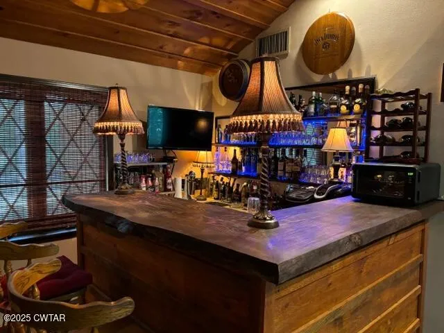 a bedroom with a bed and dresser